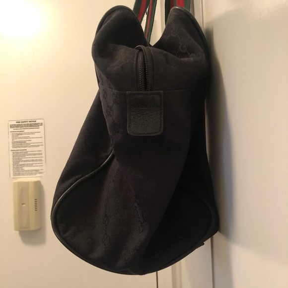 Gucci GG monogram duffle bag with signature straps